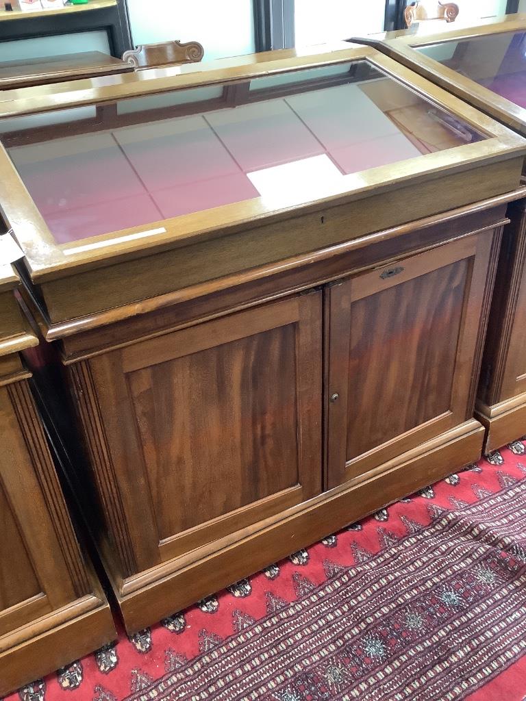 A 20th century teak table top double display case, from the Library of the Royal College of Surgeons, width 103cm depth 128cm height 108cm